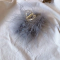 Detail shot of grey ostrich feathers on transparent hair claw clip with golden spring - 13CM Ocean Blue Feather Claw Clip