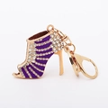 Detail of high heel keychain with purple enamel coating and sparkling rhinestones - Purple