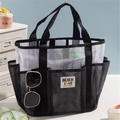 Mesh beach bag with multiple pockets in black and white finish for travel storage - Black