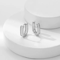 Silver U-shaped hoop earrings with baguette-cut zircon stones in a modern channel setting - Silver Clear Zirconia