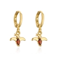 Detail of 18K gold dinosaur earrings featuring red cubic zirconia stones on white background - Bird (Red Stone)