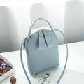 Mini light blue leather crossbody phone bag with rounded handle and long strap for women - Blue