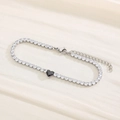 Silver-tone tennis bracelet with black heart gemstone and cubic zirconia pavé setting - Silver Black Stone (KB168993-Z)