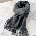 Elegant dark grey wool scarf for women with fringe details on marble surface - Carbon Gray