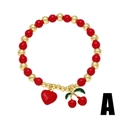 Pulsera de cuentas dulces con cerezas y corazones rojos y detalles en color dorado - Colgante Corazón Cereza (A)
