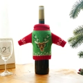 Copri bottiglia di vino natalizio in maglia con motivo a renna in rosso e verde festivo - Stile Alce