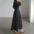 Elegant long-sleeve black cardigan maxi dress worn by a model with brown high heels - S / Black