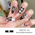 Press-on nails in black and white balletcore style with 3D bows and pearl accents - Black Bow