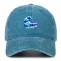 Detail of vintage navy denim baseball cap with intricate wave and shark embroidery - Lake Blue