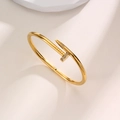 Classic gold nail bangle in polished titanium steel with sparkling crystal accents - Z245A Gold