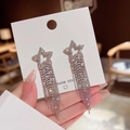 Elegante silberne Stern-Ohrringe mit glitzernden Strasssteinen und langen Quasten - Silberner Stern Quaste (E0046)