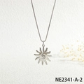 Detailed view of silver sunburst pendant with spiral center and cubic zirconia on box chain - Silver Sun Spiral