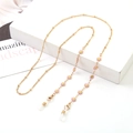 Golden eyewear chain featuring pink daisy charms with white silicone anti-slip loops - 1060-4 (Daisy Pink)