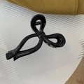 Pinza per capelli a fiocco nero lucido in resina per acconciature a coda alta - Nero