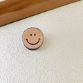 Brown acetate mini hair claw clip with a round smiley face design for bangs - Coffee