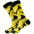 Modern mid-calf crew socks with yellow and black geometric patterns on white background - Yellow Blue Rhombus