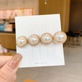 Elegant gold hair clip with four round pearls on a stylish white display card - 83# Four Pearls Gold Base Clip