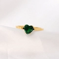 Elegant 18K gold plated stainless steel ring featuring a heart-shaped green emerald gemstone - Green + Gold