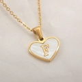 Delicate gold heart necklace with white mother of pearl inlay and letter F pendant - Letter F
