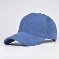 Detail of the blue corduroy baseball cap showing fine vertical ribbed texture and stitching - Adjustable / Royal Blue