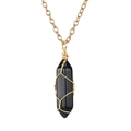 Detailed macro view of handmade wire-wrapped black hexagonal stone pendant on gold chain - Obsidian (with chain)
