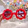 Kids flower shaped sunglasses with bright red frame and round dark lenses for girls - Red Flower