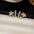 Elegant gold flower earrings with sparkling zircons on beige silk texture backdrop - Gold Diamond Flower (47# Silver Needle)