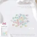 Macro-opname van 6x8mm aurora hars hart nagelcharms met glitter en verkoopverpakking - Perzikhart (SP-1116)