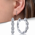 Elegant twisted hoop earrings in rose gold and silver finish with sparkling gemstones - White Gold