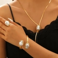 Golden Baroque irregular pearl jewelry set featuring necklace, bracelet and ring on model - Gold Baroque Pearl 3-Piece Set (57)
