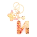 Letter N resin keychain with golden glitter, butterfly charm, and polished gold plating - Letter N