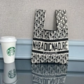 Knit tote bag featuring black and white Re Life pattern and bold fashion lettering - Letter Black