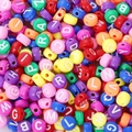 Macro shot of colorful round acrylic alphabet beads with white letters for DIY jewelry - 4x7mm Deep Colored With White Letters (100pcs)