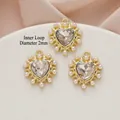 Detailed view of 23x20mm gold alloy heart pendant with crystal center and pearl edge - 529# Gold - White Zirconia