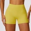 High-waisted tummy control yoga shorts in mustard yellow with seamless stretch fabric - S / Curry Yellow