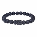 Dettaglio macro di perle in pietra lavica nera naturale e perla a cubo sul bracciale - Pietra Lavica Nera