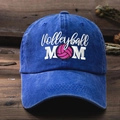 Navy blue washed cotton baseball cap with embroidered Volleyball MOM logo on wooden desk - One Size / Sapphire Blue