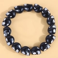 Pulsera minimalista de cuentas de calavera negra para mujer con detalles en blanco - Negro