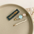 Detailed set of elegant pearl and geometric hair clips on a ceramic jewelry tray - Style 7 (3-Piece Set/Dark Blue Geometric)