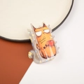 Close-up of laser finish orange cat hair claw clip with a red mug and clear text detail - Drinking Cat 7.2cm