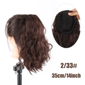 Detail view of 14-inch water wave ponytail extension with mesh net and clips - Dark Brown