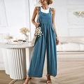 Casual blauwe jumpsuit met wijde pijpen en bandjes voor een ontspannen zomerlook - S / Meerblauw