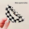 Vintage black and white checkered hair claw clip with a glossy finish and 8.5cm length - Hollow Semicircle Style (0312)