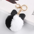 Black and white faux rabbit fur pompom keychain with a leather bow and golden clip - Black White Patchwork - Litchi Bow