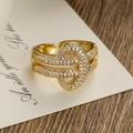 18K gold plated geometric open ring with cubic zirconia knot design on a wood base - Gold Knot Style (13903)