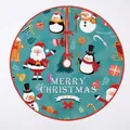 90cm turquoise Christmas tree skirt with festive penguin, snowman and Santa Claus print - Blue Merry Christmas