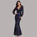 Detail shot of navy blue sequin evening gown showing V-neckline and split sleeve design - US size 2 / Navy Blue