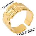 Macro view showing 1.2cm width and 1.7cm diameter of gold floral relief open ring - Gold