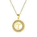 Detail of a gold stainless steel round necklace featuring a crystal-set letter T pendant - Letter T