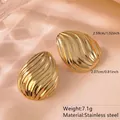 Golden wavy stainless steel stud earrings for women with flame texture finish - Flame Streamline Wave (FYD6102)